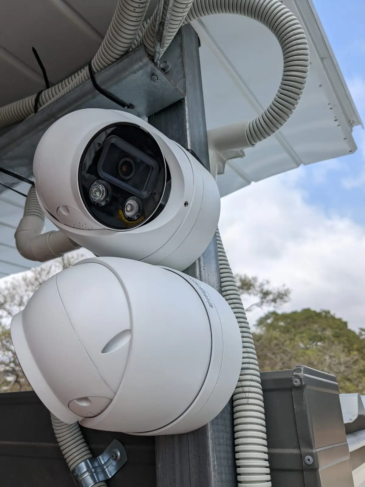Turret security cameras on a post